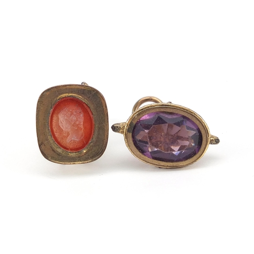 1135 - Two antique gold coloured metal fobs, one with intaglio seal, the other with amethyst, each 2.5cm hi... 