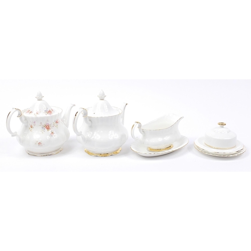 509 - Royal Albert teaware including Peach Rose and Val D'or teapots, each teapot 25cm in length