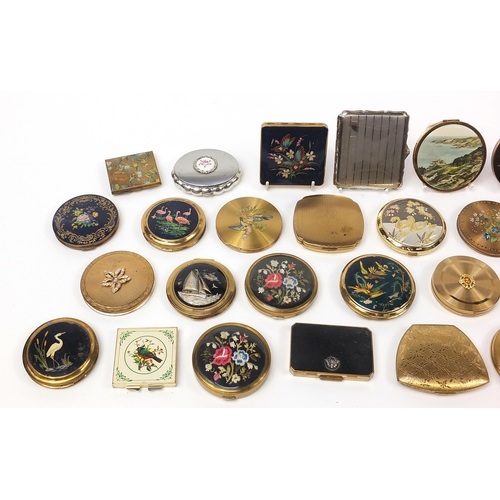 128 - Thirty vintage ladies compacts, some with cases and cigarette cases including Stratton