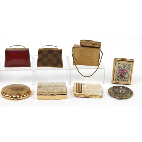 127 - Thirteen vintage compacts and cigarette boxes including examples in the form of a handbag and Kigu