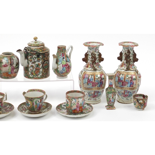 245 - Chinese Canton porcelain including a pair of vases, teapot and plates, the largest each 25cm high