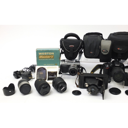 1411 - Antique and later cameras and accessories including Lumix, Canon T70 and Nikon D3200