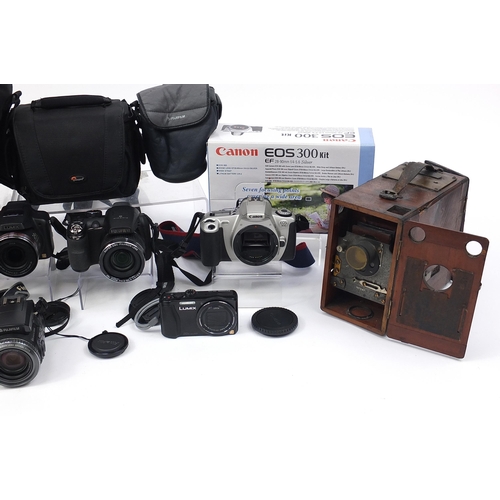 1411 - Antique and later cameras and accessories including Lumix, Canon T70 and Nikon D3200