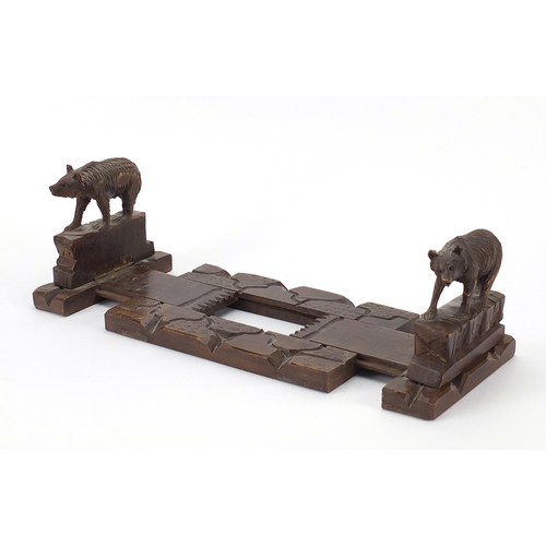 191 - Black Forest extending book slide carved with two bears, 27.5cm wide when closed