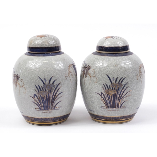 1280 - Pair of Chinese crackle glaze porcelain ginger jars with covers decorated with birds amongst flowers... 