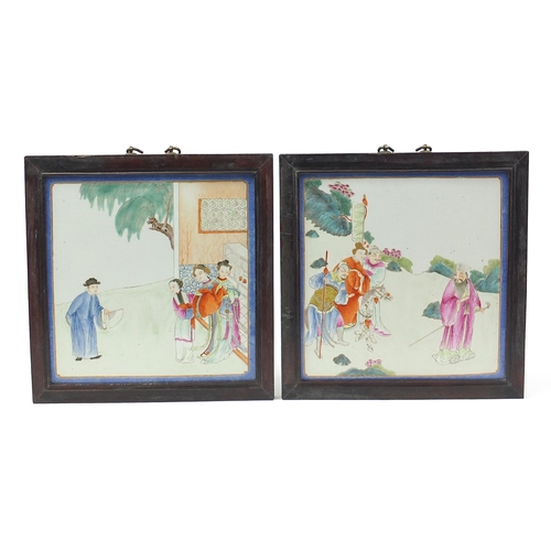 156 - Pair of Chinese porcelain panels housed in hardwood frames, each hand painted in the famille rose pa... 