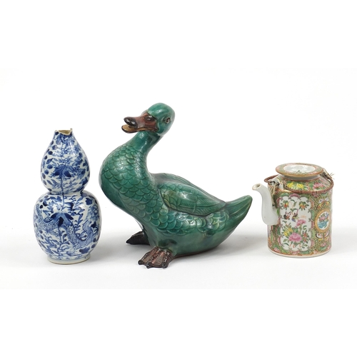 402A - Chinese ceramics including a Canton teapot, green glazed Mandarin duck and blue and white porcelain ... 