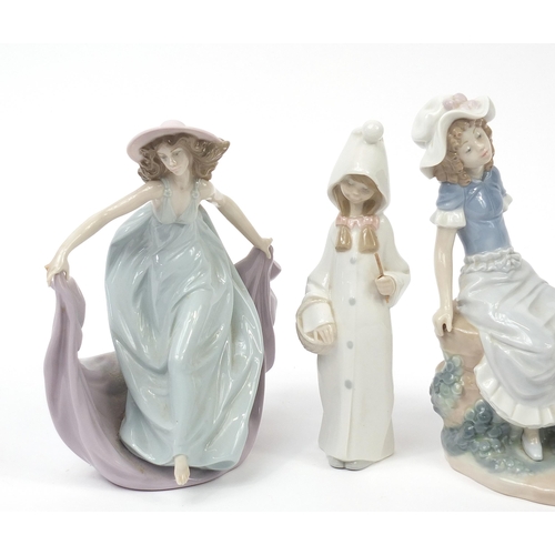 488 - Nao and Lladro to include a horse and a figure group of a young boy and girl, the largest 23cm high