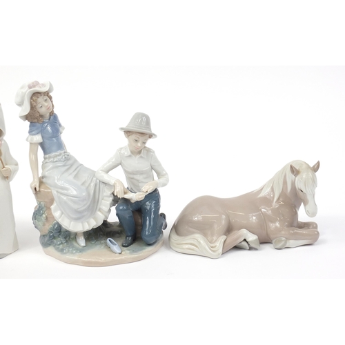 488 - Nao and Lladro to include a horse and a figure group of a young boy and girl, the largest 23cm high