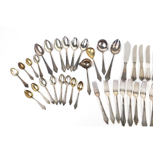 1317 - WMF, German Art Nouveau silver plated cutlery decorated with flowers, the largest 27cm in length