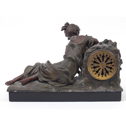 109 - Art Nouveau spelter maiden design mantle clock with circular enamel dial having Arabic numerals, 44c... 