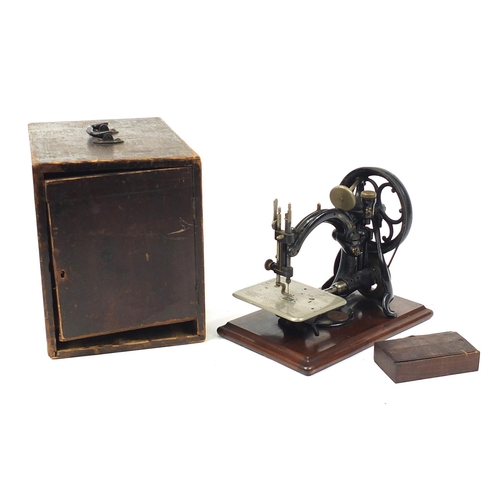 375 - Willcox & Gibbs hand operated sewing machine with case, the case 35.5cm in length