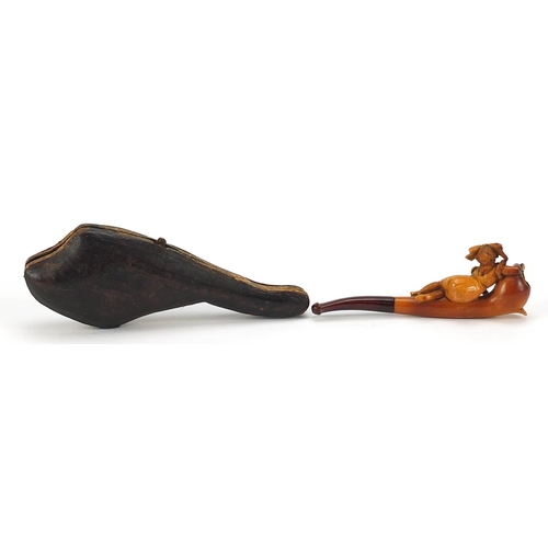 1766 - Meerschaum pipe carved in the form of a reclining female, with fitted box, 11.5cm in length