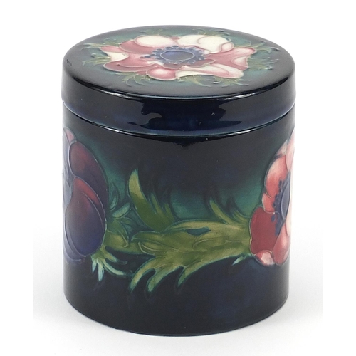 325 - Moorcroft pottery jar and cover hand painted with flowers, 9.5cm high