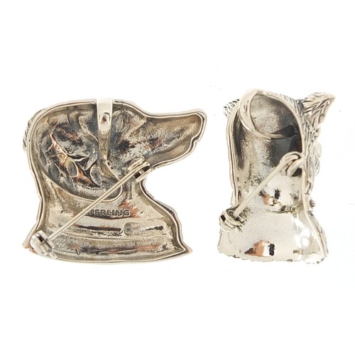 1113 - Two sterling silver dog's head brooch pendants, the largest 3cm wide, total weight 23.0g