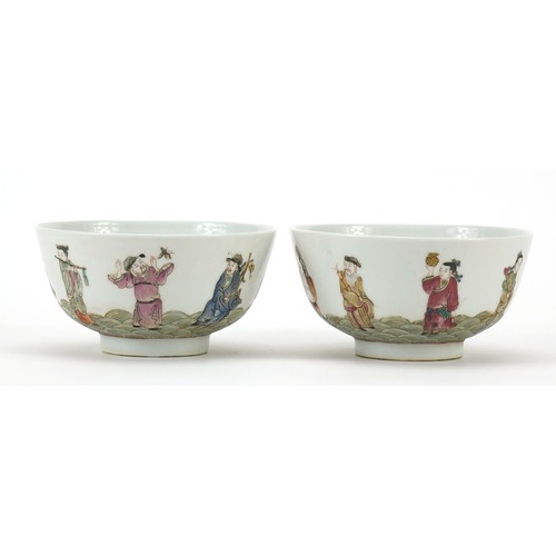 157 - Pair of Chinese porcelain bowls hand painted in the famille rose palette with figures on waves, char... 