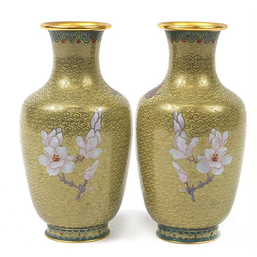 1230 - Pair of Chinese cloisonne vases, each enamelled with a butterfly amongst flowers, 21cm high