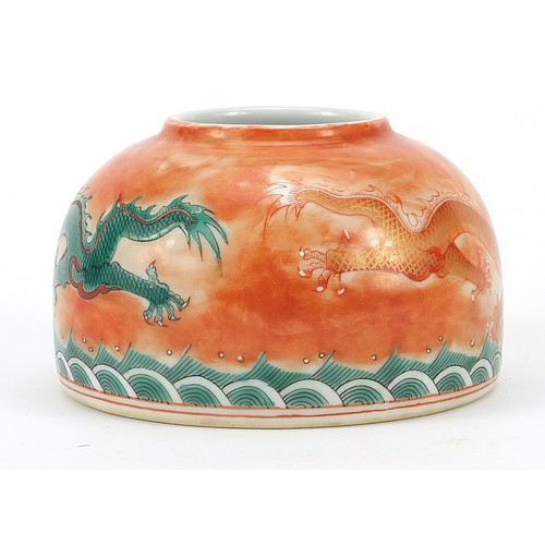 199 - Chinese porcelain beehive water pot hand painted with two dragons chasing a flaming pearl above cras... 