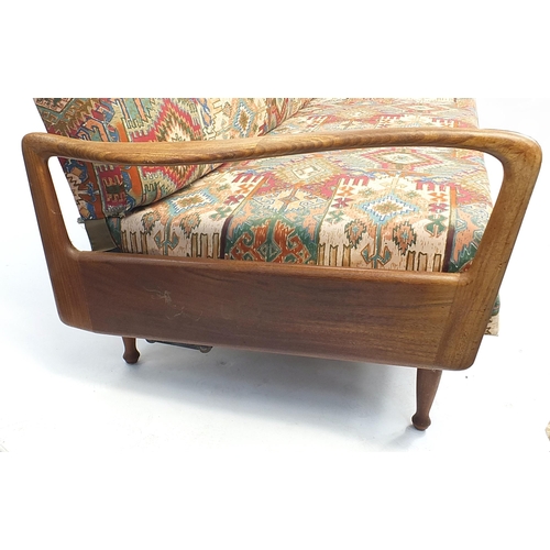 641 - Mid century Scandinavian teak sofa bed with geometric upholstery, 205cm wide