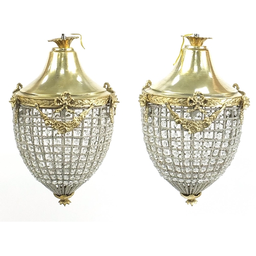 693 - Pair of ornate chandeliers with gilt metal mounts, 50cm high