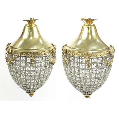 693 - Pair of ornate chandeliers with gilt metal mounts, 50cm high