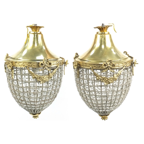 693 - Pair of ornate chandeliers with gilt metal mounts, 50cm high