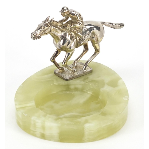 328 - Art Deco onyx ashtray mounted with a silvered horse and jockey, 14.5cm in length