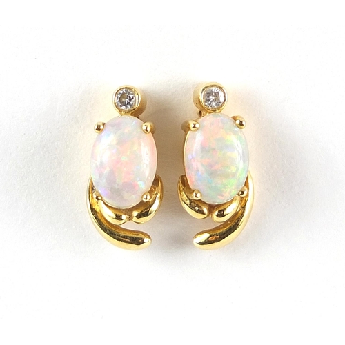 918 - Pair of 9ct gold cabochon opal and diamond stud earrings, 1.3cm high, 2.0g