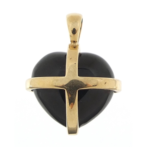 922 - 9ct gold black onyx love heart pendant, 2.4cm high, 3.8g