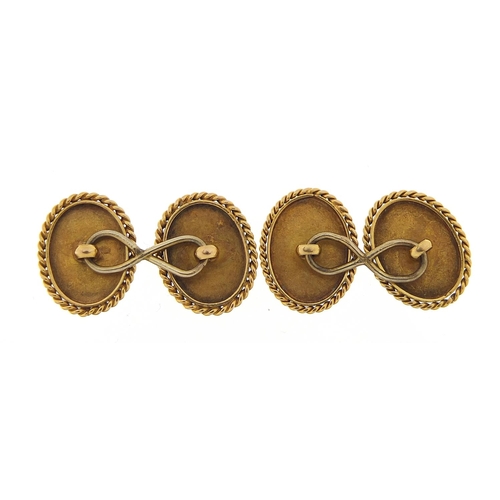 923 - Pair of unmarked gold masonic cufflinks, (tests as 15ct+ gold) 1.5cm in length, 5.1g