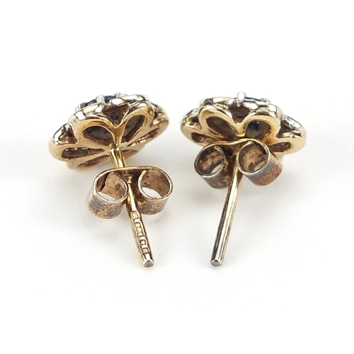 926 - Pair of 9ct gold sapphire and diamond flower head stud earrings, 1cm in diameter, 2.1g