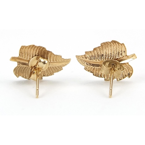 1023 - Pair of 9ct gold leaf stud earrings, 1cm high, 0.3g