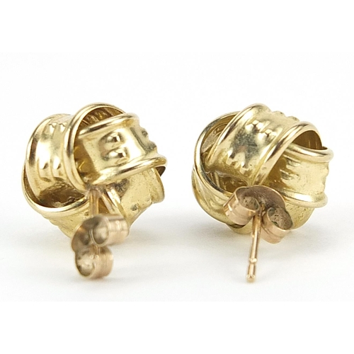 1025 - Pair of 9ct gold knot stud earring, 1.2cm in diameter, 1.6g