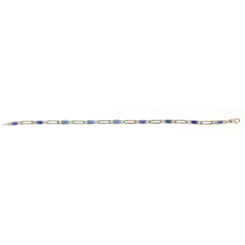 1064 - Silver, blue sapphire and cubic zirconia bracelet, 20cm in length, 9.8g