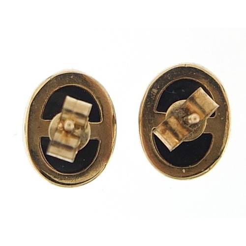 945 - Pair of 9ct gold cabochon black onyx stud earrings, 9mm high, 1.7g