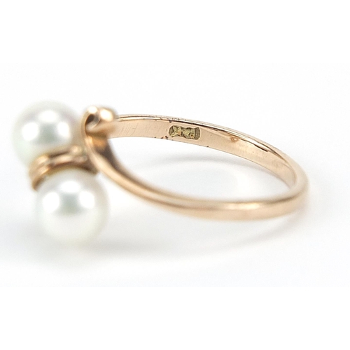 949 - 14ct gold cultured pearl crossover ring, size N, 2.5g