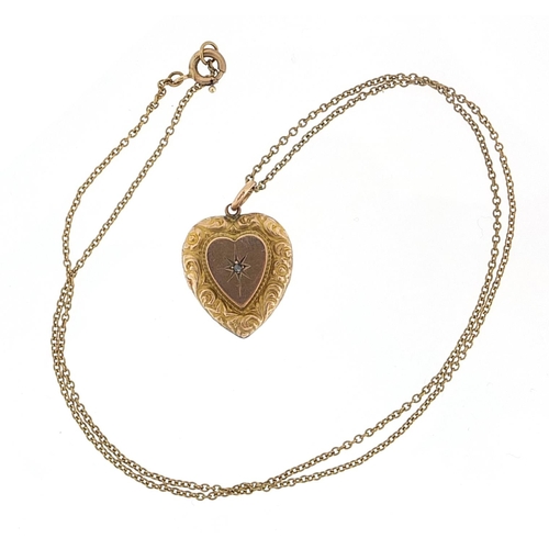 950 - Antique unmarked gold love heart mourning locket set with a diamond on a 9ct gold necklace, 2cm high... 