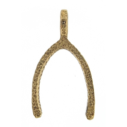 978 - 9ct gold wishbone charm, 2.2cm high, 1.3g