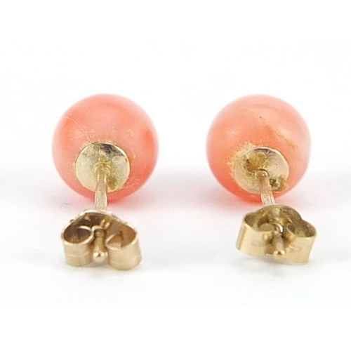 982 - Pair of 9ct gold pink coral ball stud earrings, 6mm in diameter, 0.8g