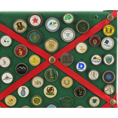 1286 - Collection of vintage and later golf badges mounted on a board