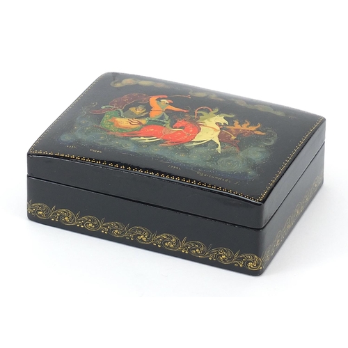 258 - Russian lacquered box and cover hand painted with a troika, 10cm wide