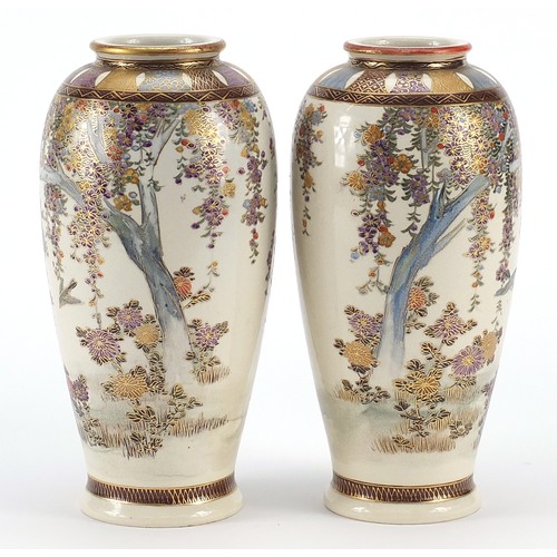 302 - Pair of Japanese Satsuma pottery vases hand painted with birds amongst flowers, character marks to t... 