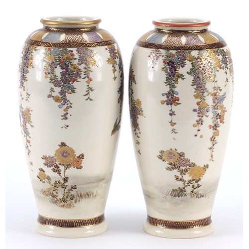 302 - Pair of Japanese Satsuma pottery vases hand painted with birds amongst flowers, character marks to t... 