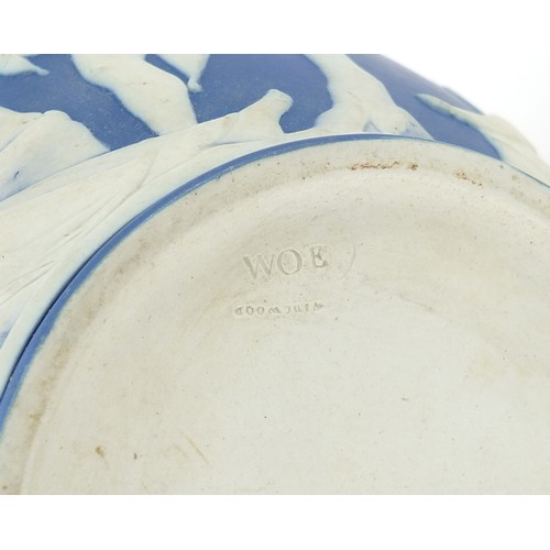 179A - Wedgwood blue and white Jasperware Portland vase, relief decorated with classical figures, 21cm high