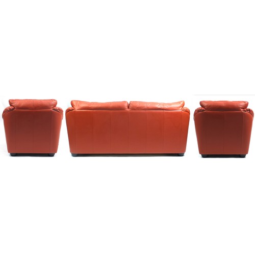 649 - Ikea orange leather two seater sofa bed and two armchairs, the sofa 200cm wide