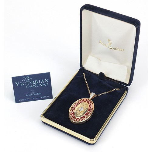 796 - The Victoria Collection Carlyle 14ct gold enamel and diamond locket on a 14ct gold necklace, with ce... 