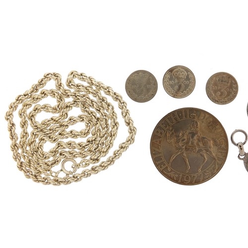 1149 - Jewellery and coins comprising a silver rope twist necklace, 60cm in length, 16.8g, three silver thr... 