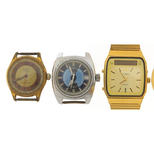 1166 - Five vintage and later gentlemen's wristwatches including an Adrem Jump Hour watch, Timex and Invict... 