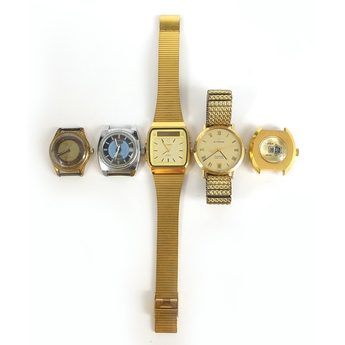 1166 - Five vintage and later gentlemen's wristwatches including an Adrem Jump Hour watch, Timex and Invict... 