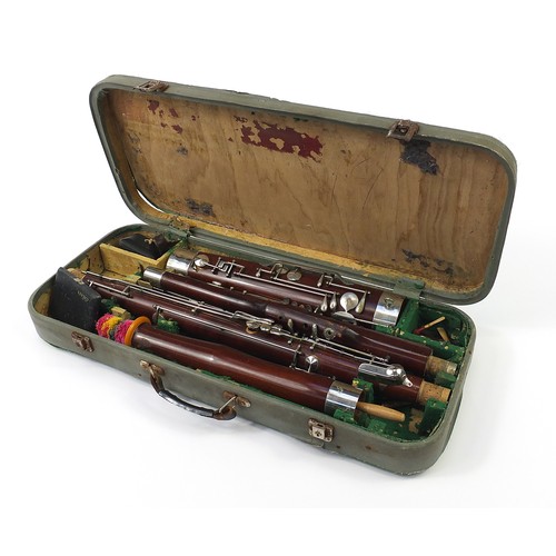 696 - Vintage Adler Sonora bassoon housed in a fitted case